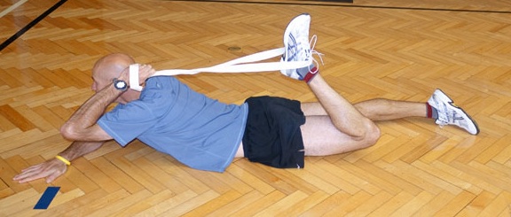 Dan Kehlenbach demonstrating the hip flexors stretch for bicycle riders